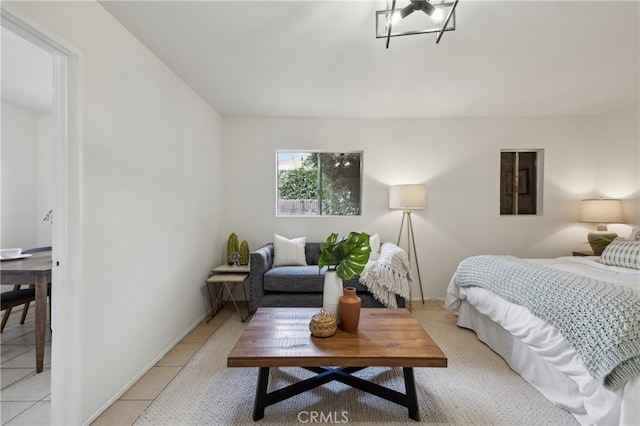 bedroom with light tile patterned flooring