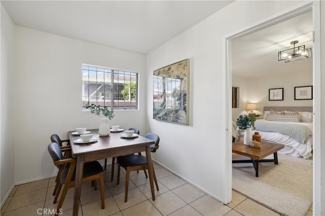 dining space with light tile patterned flooring