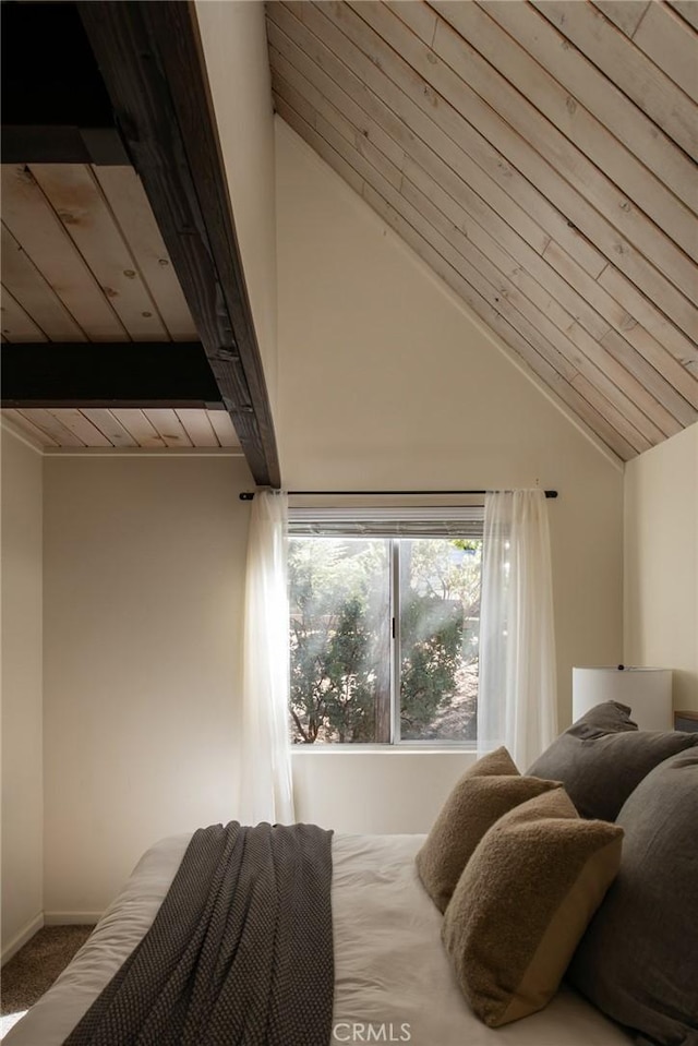 bedroom with wood ceiling, carpet, and lofted ceiling with beams