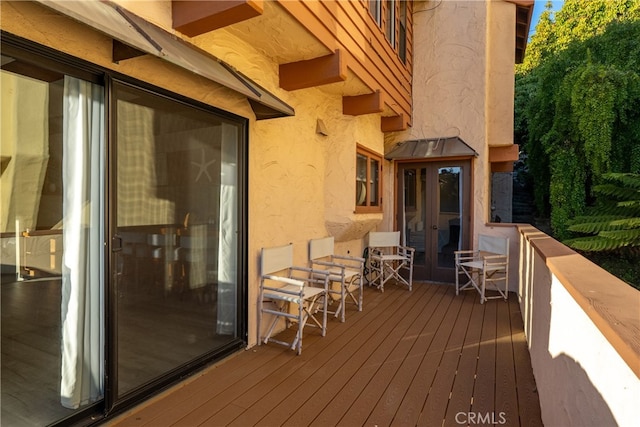 wooden terrace with french doors