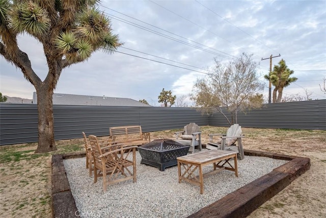 view of patio / terrace with a fire pit