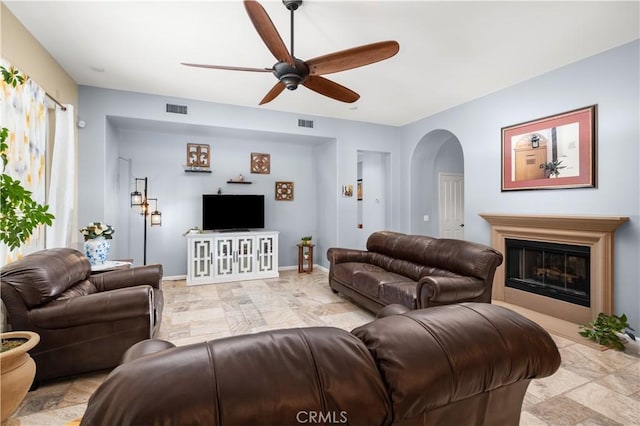 living room featuring ceiling fan