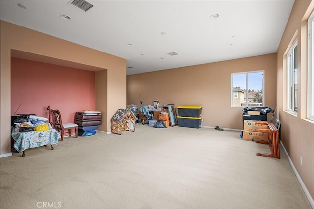 playroom featuring light colored carpet