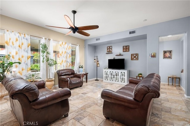 living room featuring ceiling fan