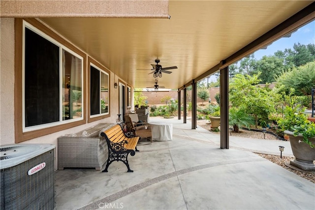 view of patio / terrace featuring ceiling fan and cooling unit