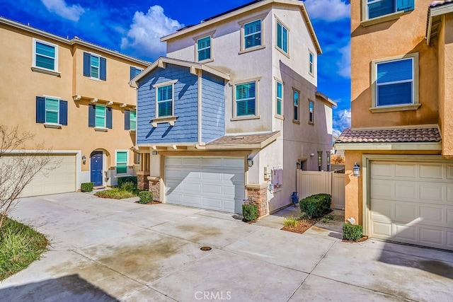 multi unit property featuring a garage