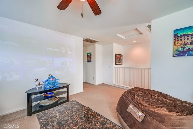 living room with light carpet and ceiling fan