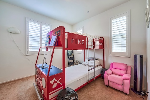 bedroom featuring carpet