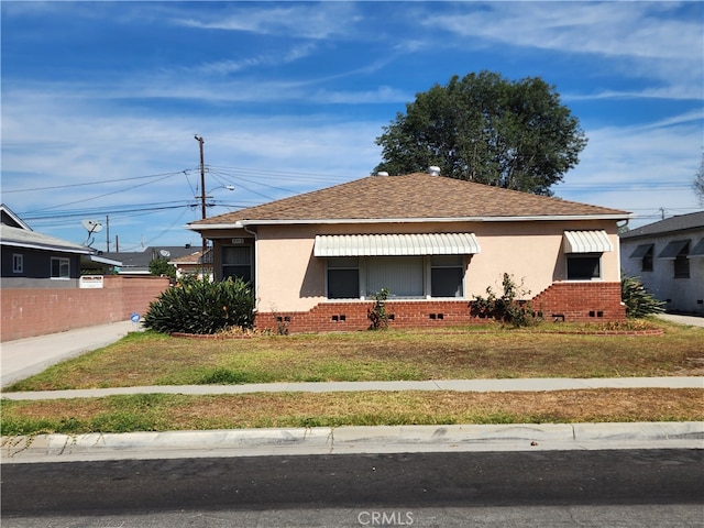 view of home's exterior featuring a lawn