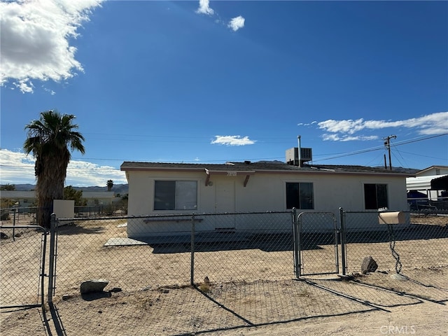 exterior space featuring central AC unit