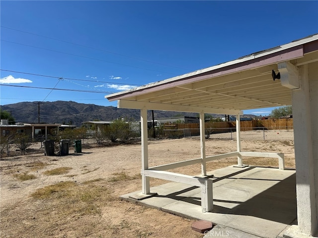 exterior space featuring a mountain view