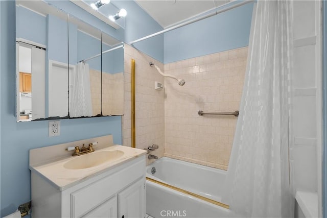 bathroom featuring shower / tub combo with curtain and vanity