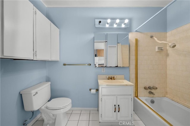 full bathroom with toilet, tile patterned flooring, vanity, and tiled shower / bath