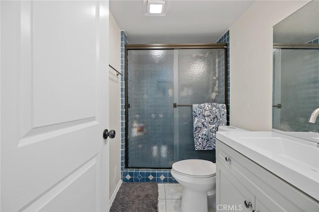 18411 Hatteras St Unit 120, Tarzana, CA 91356 - full bath with vanity, toilet, a shower stall, and tile patterned flooring