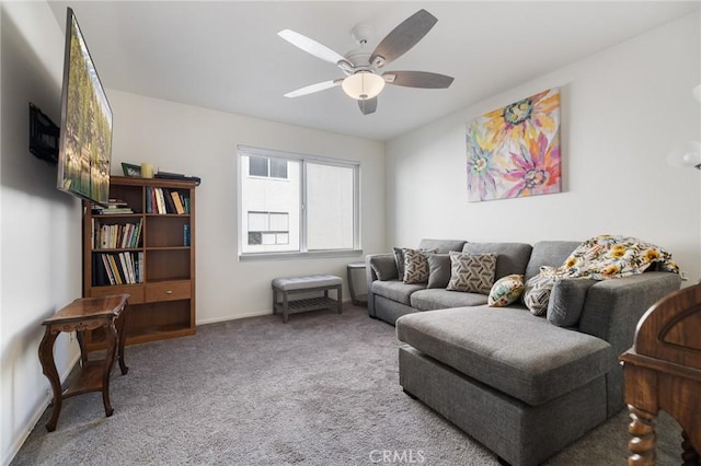 carpeted living room featuring ceiling fan