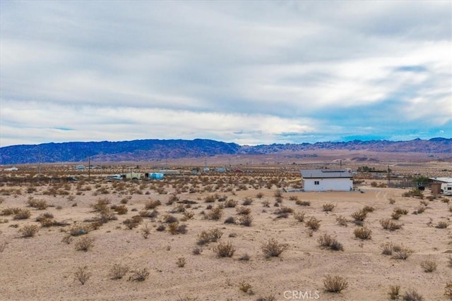 69444 Valle Vista Rd Unit 29, Palms, CA 92277 - view of mountain backdrop featuring a desert landscape and rural landscape