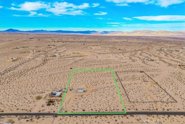 69444 Valle Vista Rd Unit 29, Palms, CA 92277 - view of rural area with a mountainous background, a desert landscape, and property boundaries highlighted