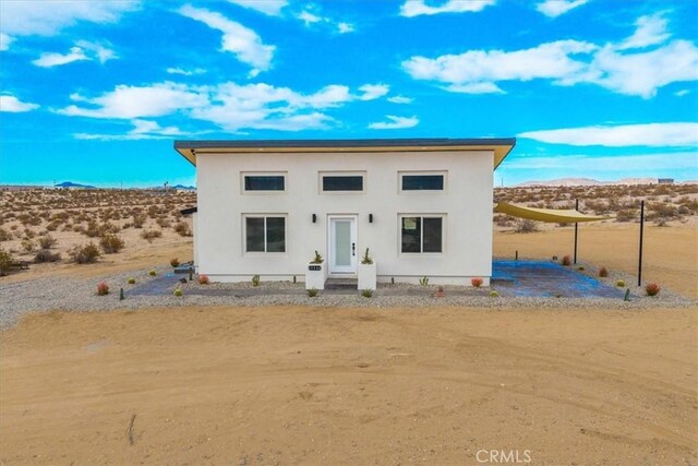 view of front of house with a mountain view