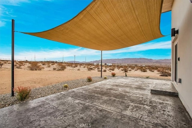 69444 Valle Vista Rd Unit 29, Palms, CA 92277 - view of patio / terrace with a mountain view and a desert view
