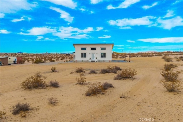 69444 Valle Vista Rd Unit 29, Palms, CA 92277 - view of front of home with view of desert landscape and stucco siding
