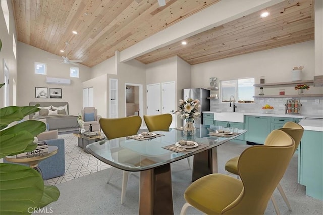 dining space featuring sink, wood ceiling, ceiling fan, a wall unit AC, and high vaulted ceiling