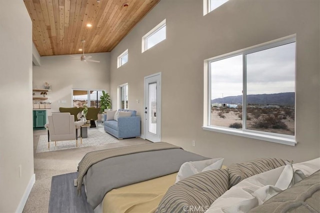 69444 Valle Vista Rd Unit 29, Palms, CA 92277 - bedroom with wooden ceiling, a high ceiling, recessed lighting, baseboards, and access to exterior
