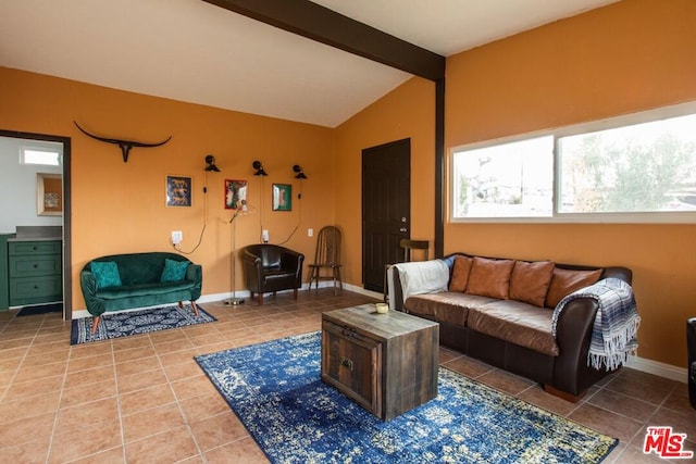 tiled living room with vaulted ceiling with beams