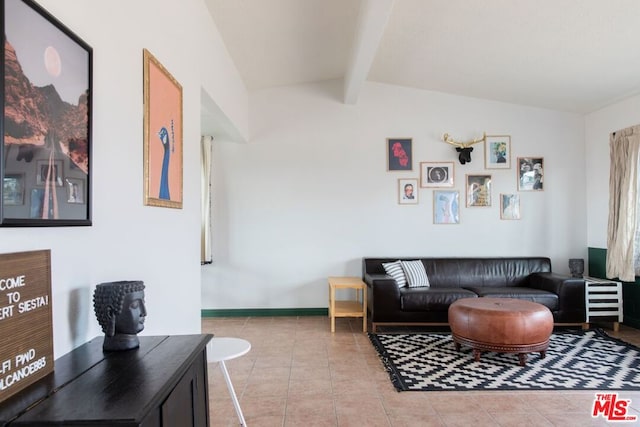 living room featuring light tile patterned floors and lofted ceiling with beams