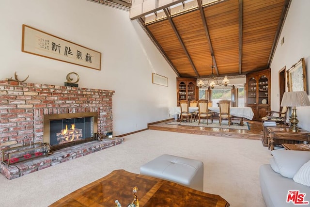 living room featuring carpet, wood ceiling, high vaulted ceiling, and a brick fireplace