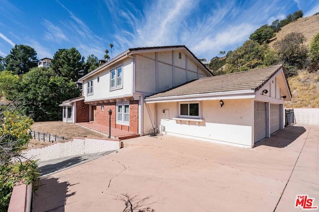 view of front of home featuring a garage