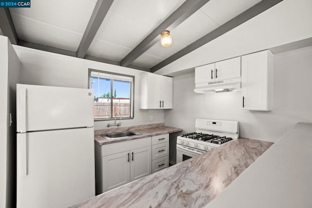 kitchen featuring vaulted ceiling with beams, white cabinetry, sink, and white appliances