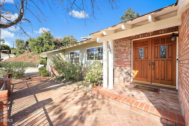 property entrance with a porch