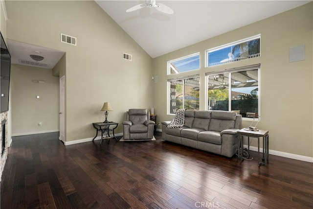 living room featuring ceiling fan, high vaulted ceiling, and dark hardwood / wood-style floors