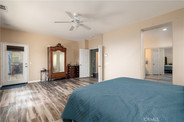 bedroom featuring wood-type flooring and ceiling fan