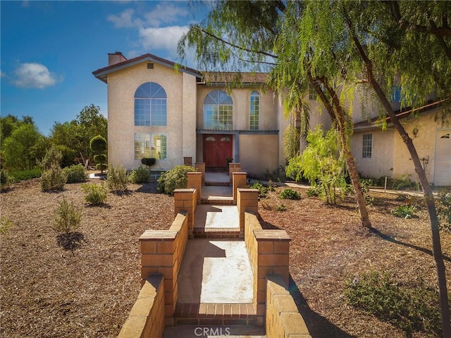 view of mediterranean / spanish-style house