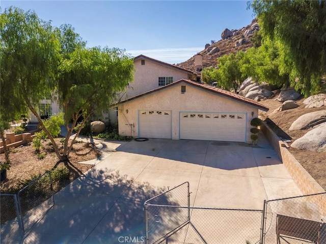 view of front of home featuring a garage