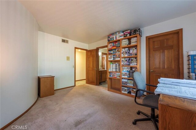 home office with light colored carpet