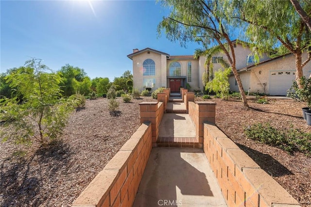 view of front of home with a garage