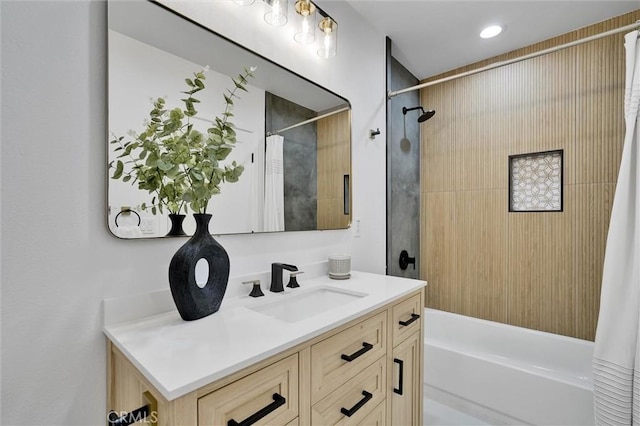 bathroom with shower / bath combo and vanity