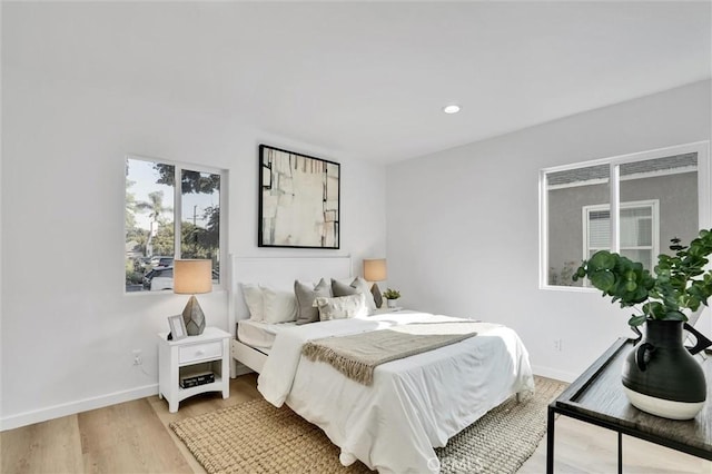 bedroom featuring wood-type flooring