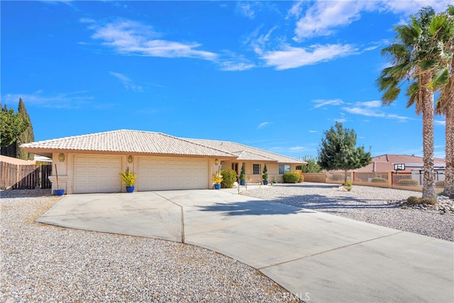 single story home featuring a garage