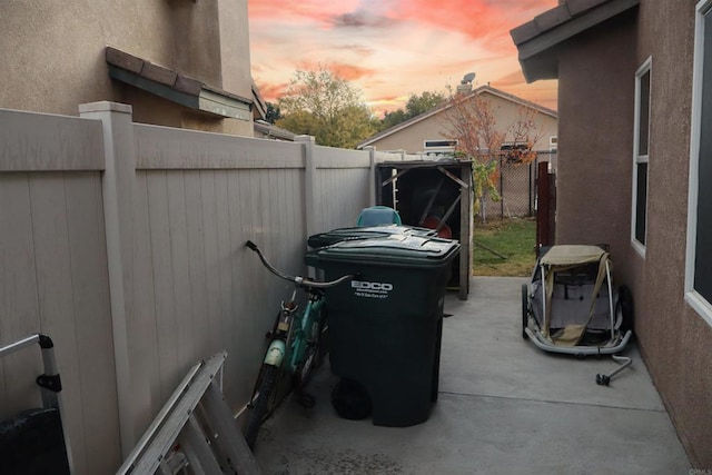 view of patio terrace at dusk