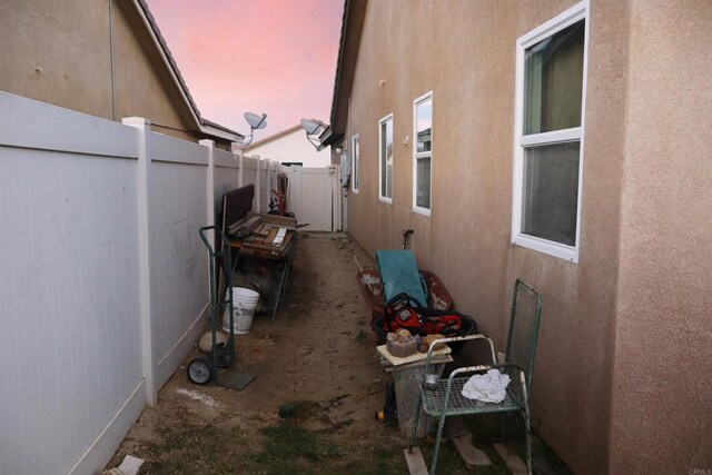 view of property exterior at dusk