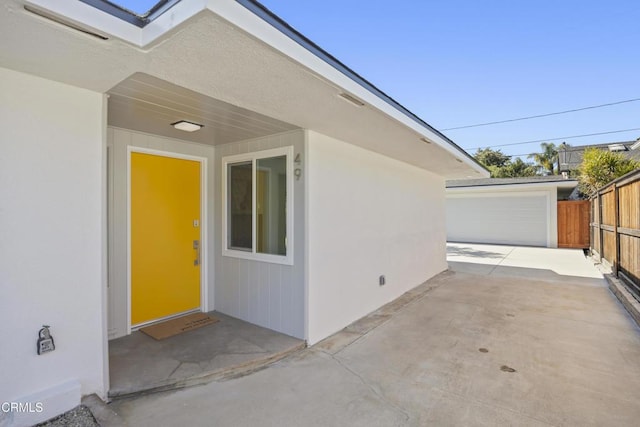 property entrance with a patio area