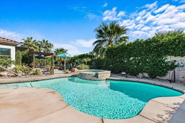 view of swimming pool with a patio area and an in ground hot tub