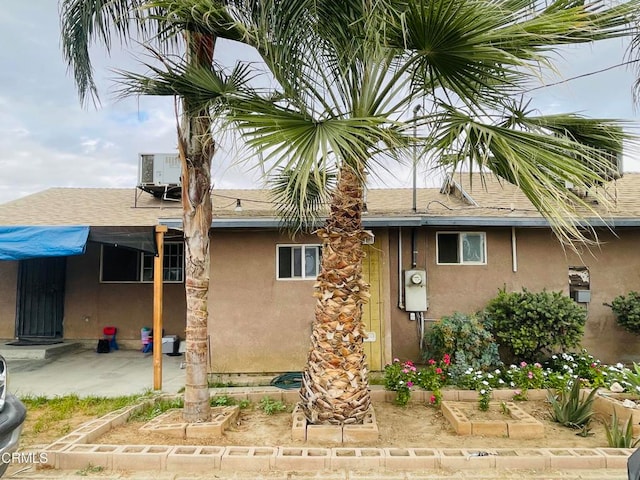 back of house featuring a patio