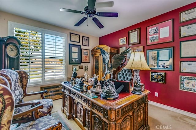 carpeted home office featuring a wealth of natural light and ceiling fan