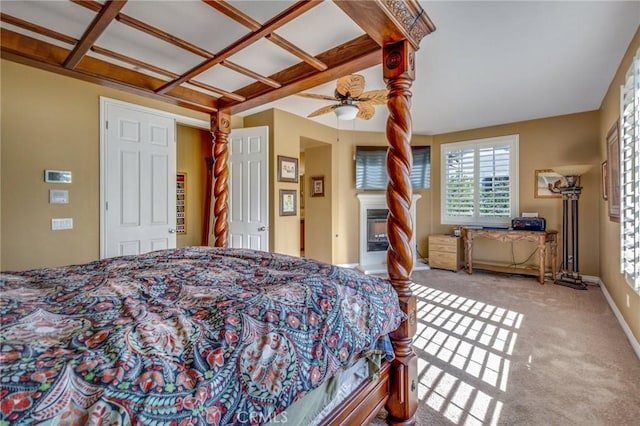 bedroom with ceiling fan and light carpet