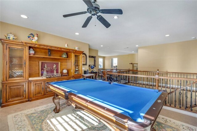 rec room with ceiling fan, light colored carpet, and billiards