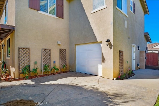 view of side of home with a garage